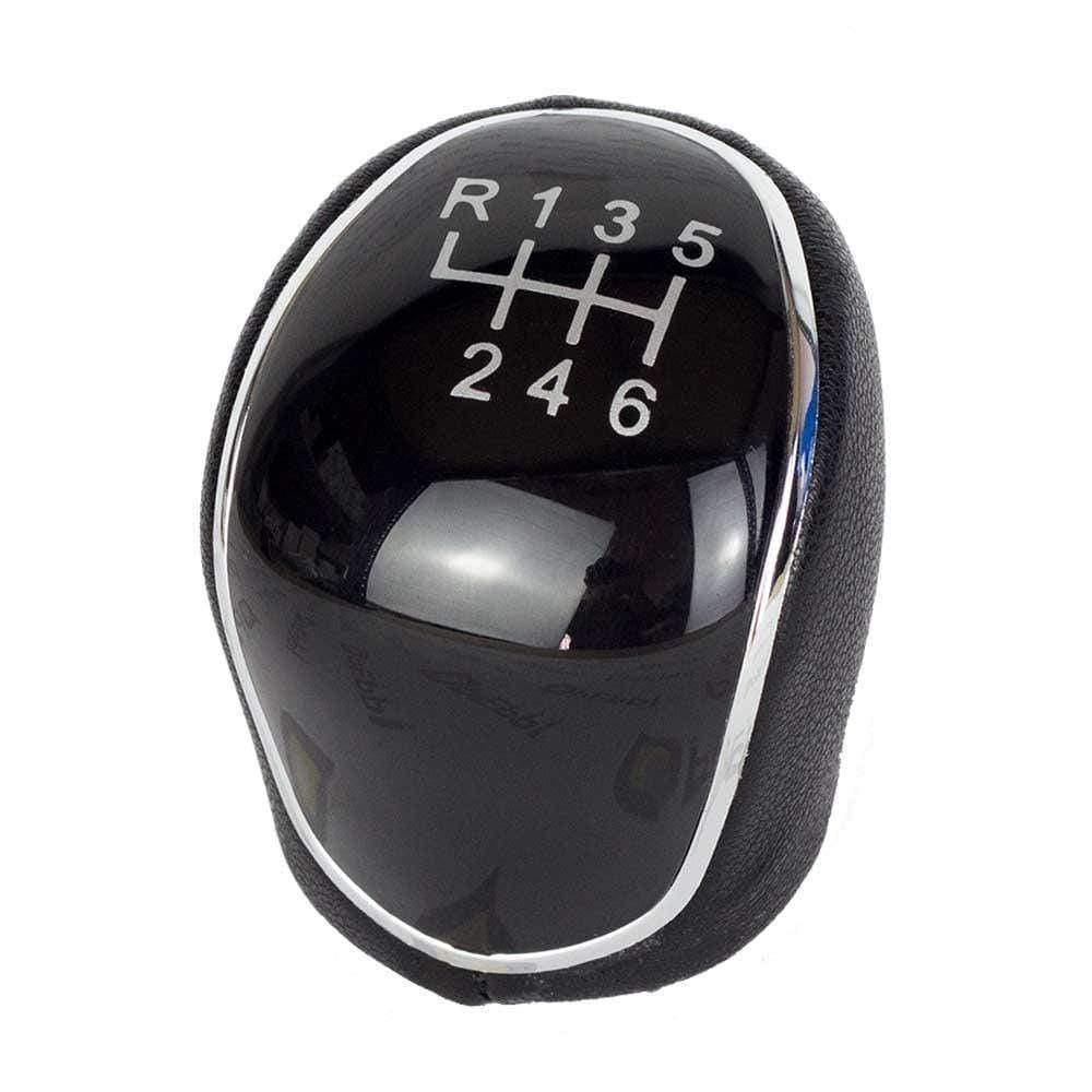 Fekete színű, 6 sebességes Ford váltógomb. Fekete számlappal, króm számlapkerettel.