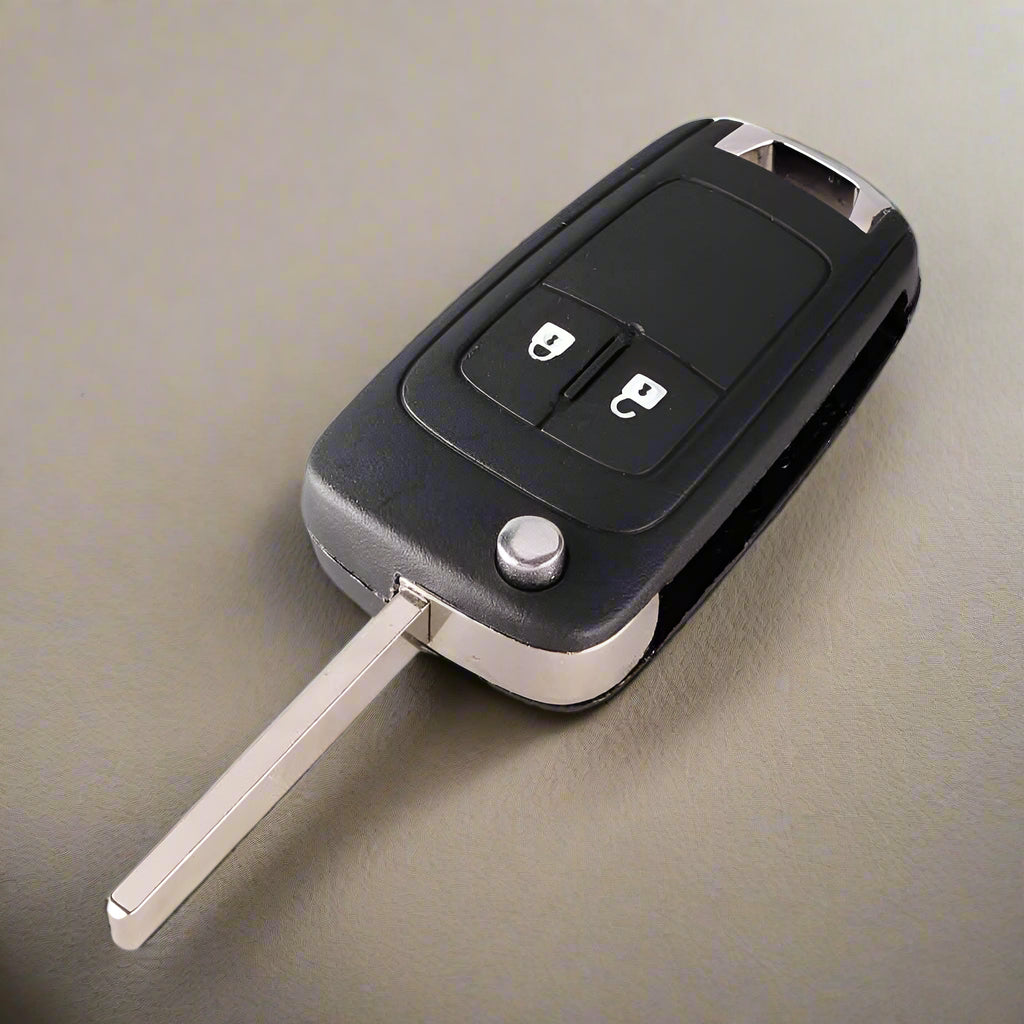 Fekete színű, 2 gombos Opel kulcsház, bicskakulcs.