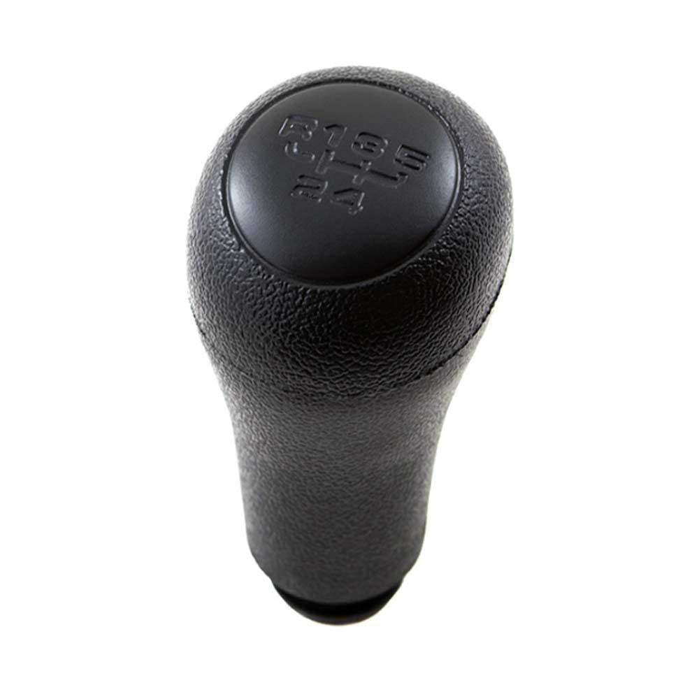 Fekete színű, 5 sebességes VW váltógomb.