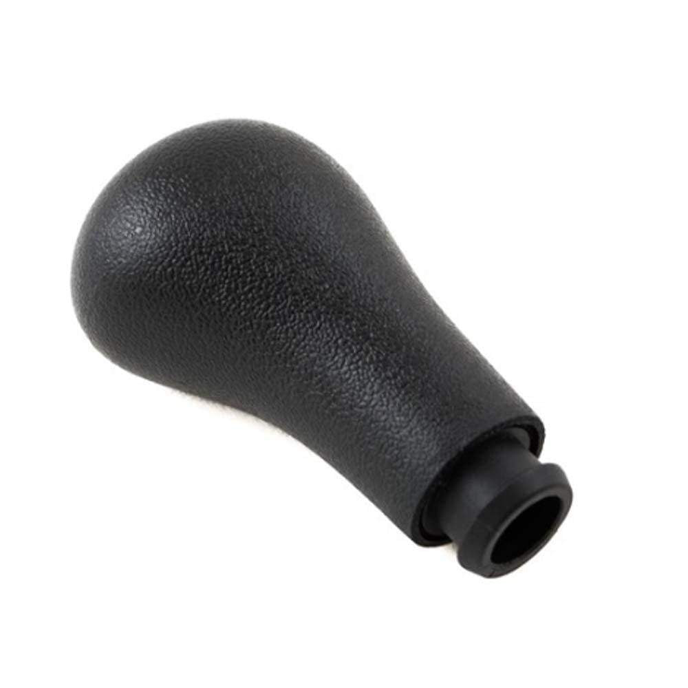 Fekete színű, 5 sebességes VW váltógomb.