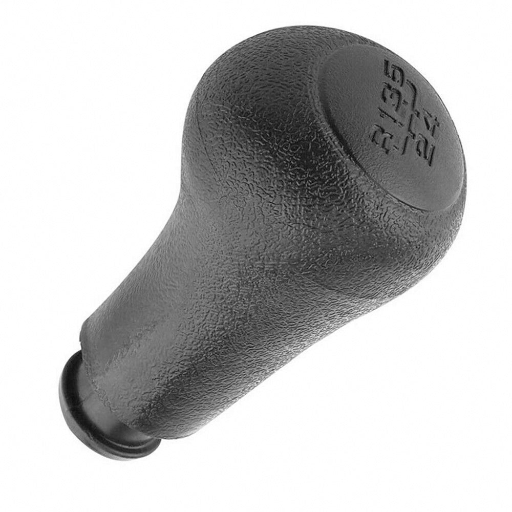 Fekete színű, 5 sebességes VW váltógomb.