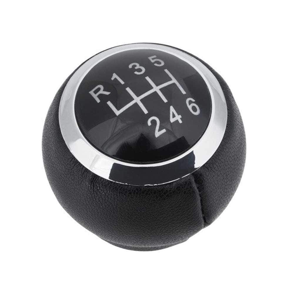 Fekete színű, bőrözött 6 sebességes Toyota váltógomb. Fekete színű számlappal, króm számlapkerettel.