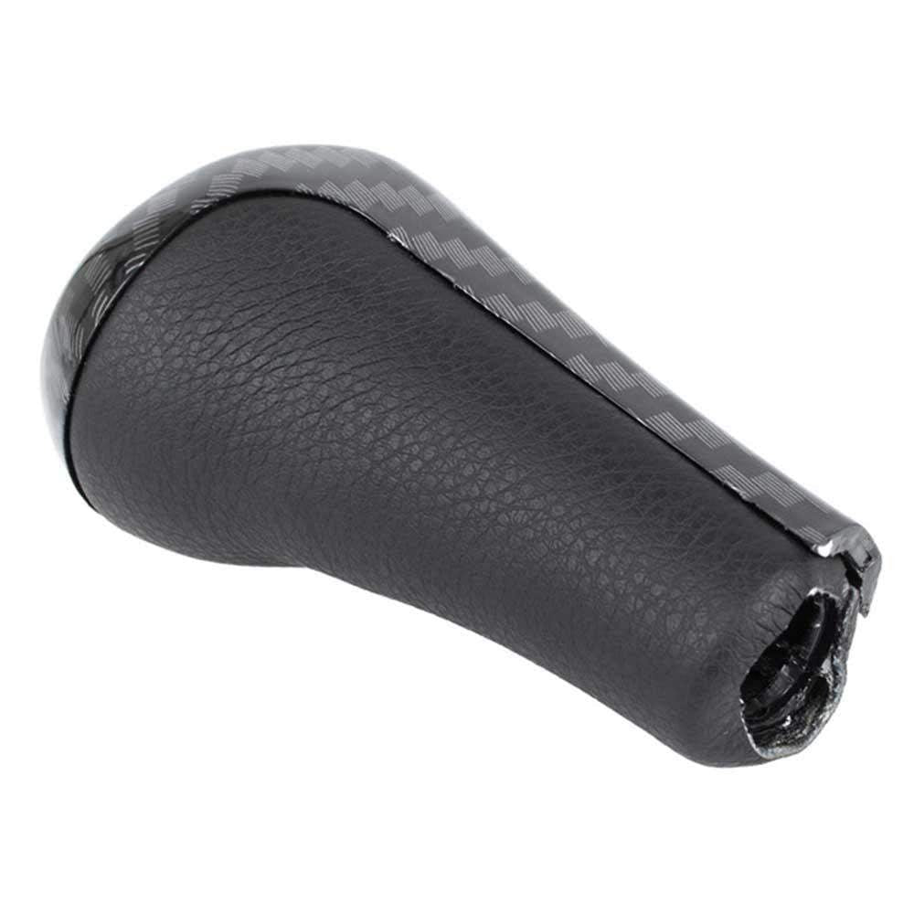 Fekete és carbon színű, 6 sebességes BMW váltógomb.