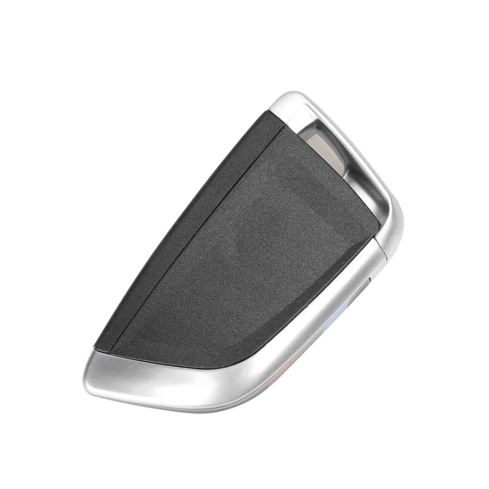 Ezüst és fekete színű, 3 gombos BMW kulcs, kulcsház hátulja.