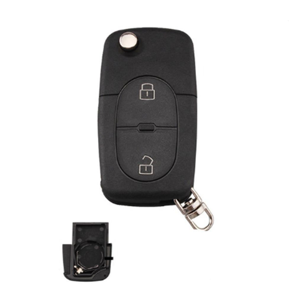 Fekete színű, 2 gombos Audi bicskakulcs, kulcsház.