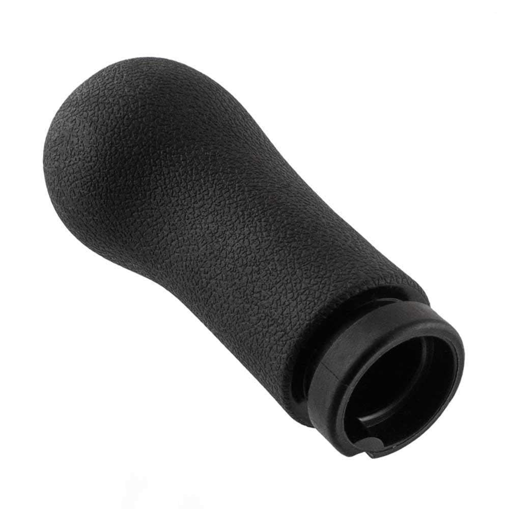 Fekete színű, 5 sebességes Ford váltógomb. 