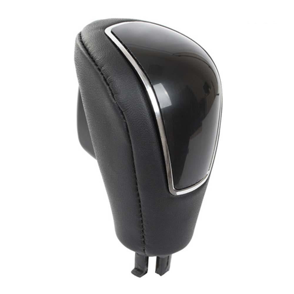 Fekete színű, bőrözött automata Ford váltógomb. Fekete színű üveg számlappal, króm számlapkerettel.