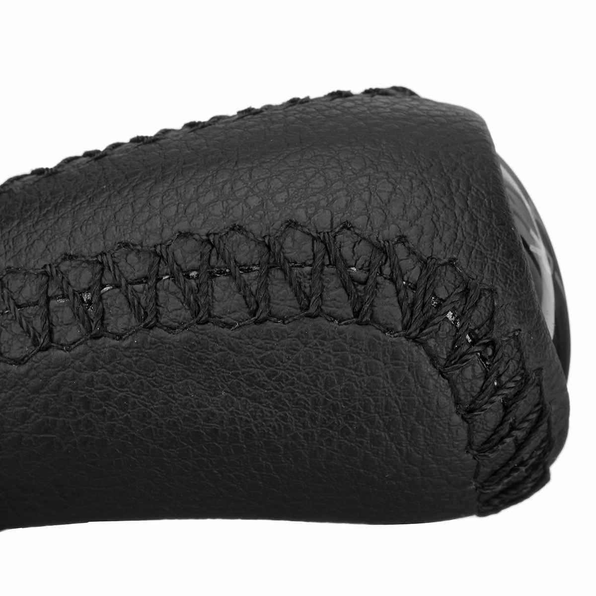 Fekete színű, 5 sebességes bőr Mazda váltógomb. 5 fokozatos üveg számlappal