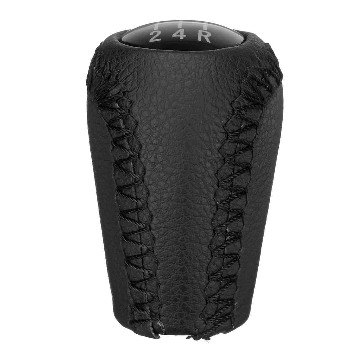 Fekete színű, 5 sebességes bőr Mazda váltógomb. 5 fokozatos üveg számlappal