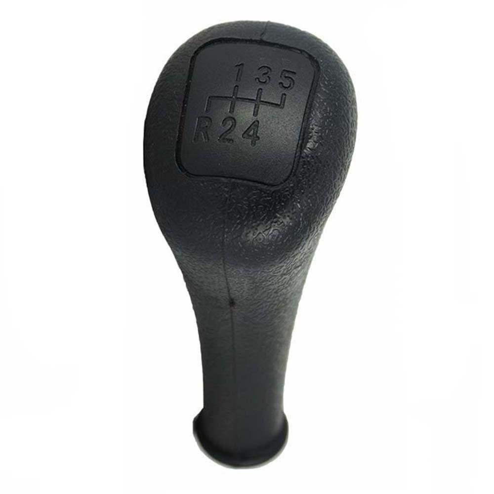 Fekete színű, 5 sebességes Mercedes váltógomb