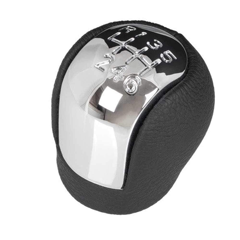 Fekete színű, bőrözött 6 sebességes Opel váltógomb. Krómozott számlappal.